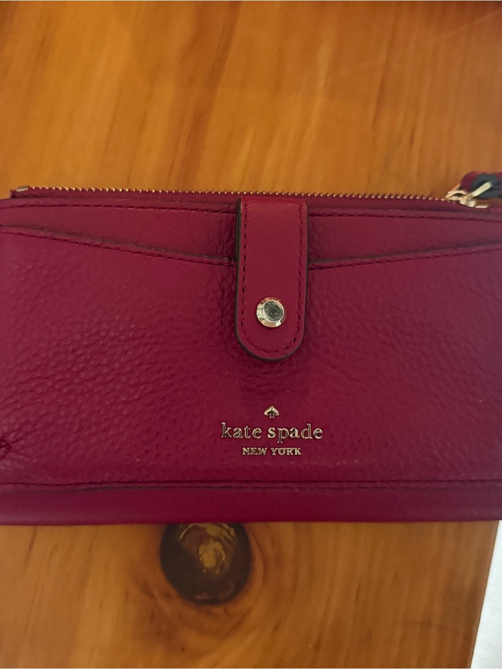 kate spade raspberry pebbled leather continental wallet with gold logo